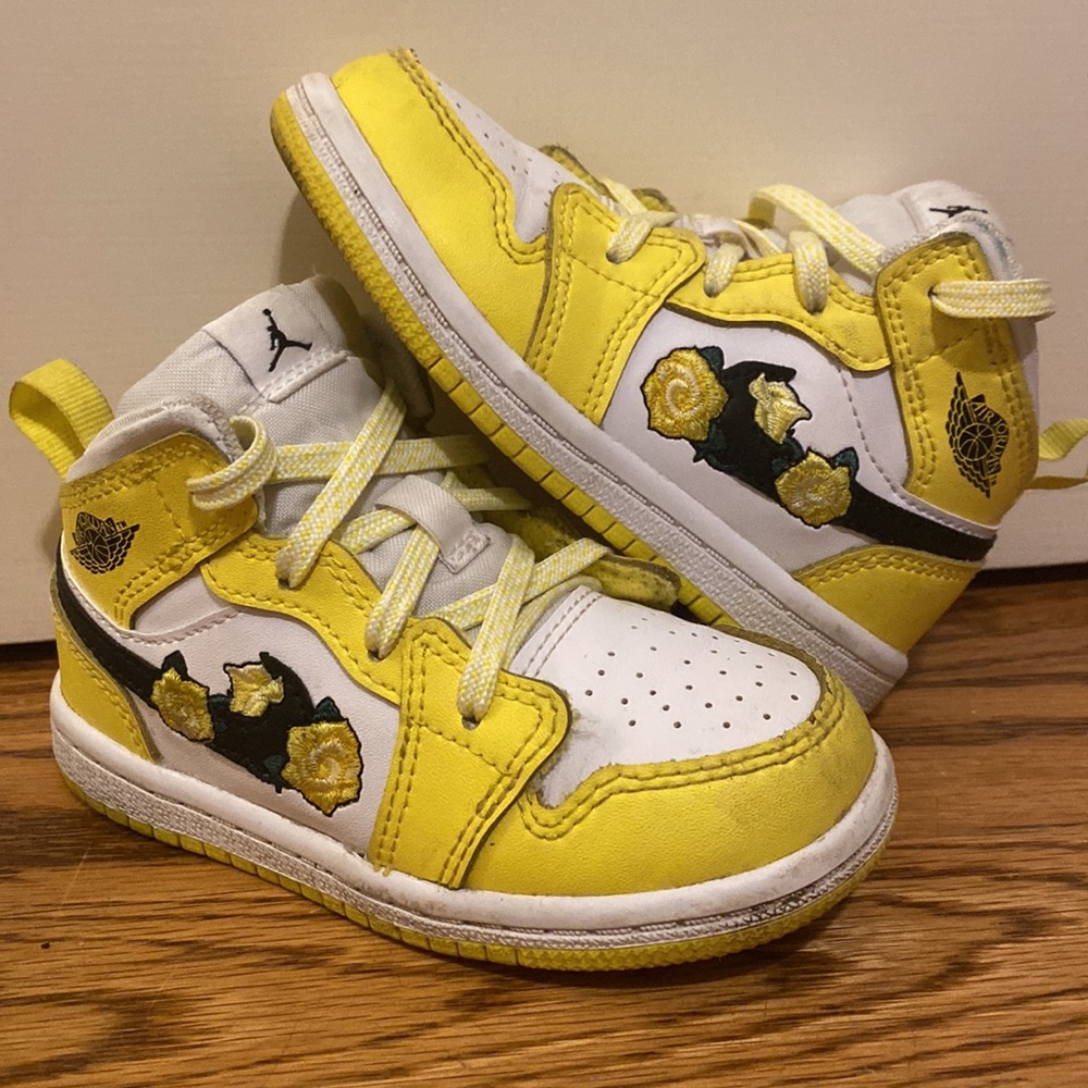 Toddler Air Jordans with yellow flowers